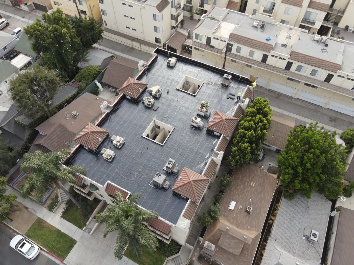 Multi-family flat roof replacement — after