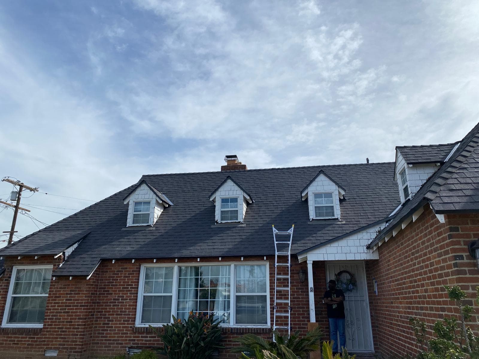 Full re-roof of a brick Cape Cod home — Roof Replacement in Los Angeles